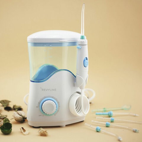 Ирригатор для полости рта REVYLINE RL 100, стационарный, емкость резервуара 0,6 л, 7 насадок, белый 456551