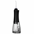 Ирригатор для полости рта REVYLINE RL 450 New, портативный, емкость резервуара 0,3 л, 5 насадок, черный, 7993 457240